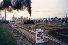 An Allis Chalmers tractor at a pull competition.