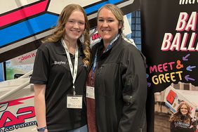 Bayley Ballenger poses with her mom, Cindy, by Bayleyâs racecar. Bayley has been racing sprint cars since she was 14.